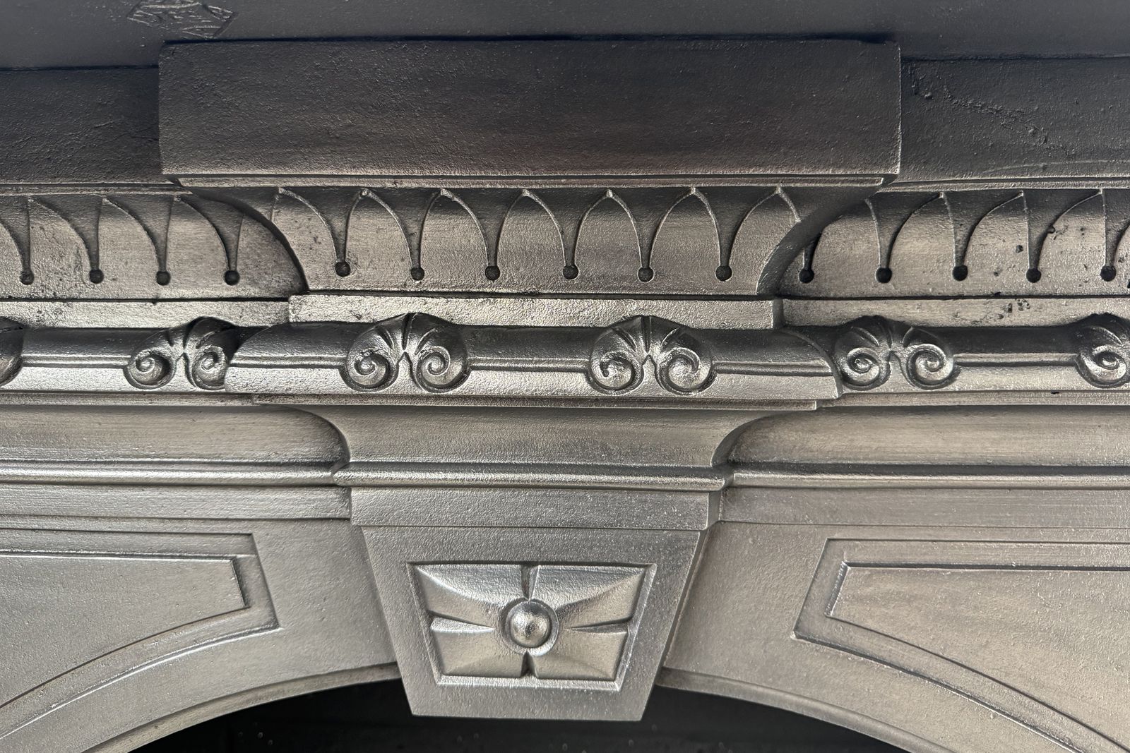 19th Century Victorian Arched Cast Iron Fireplace Surround photo vinterior