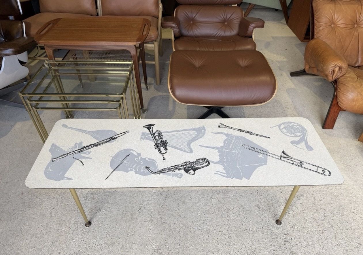 Retro Mid Century Coffee Table With Various Music Instruments On Top 1960s photo 385.0