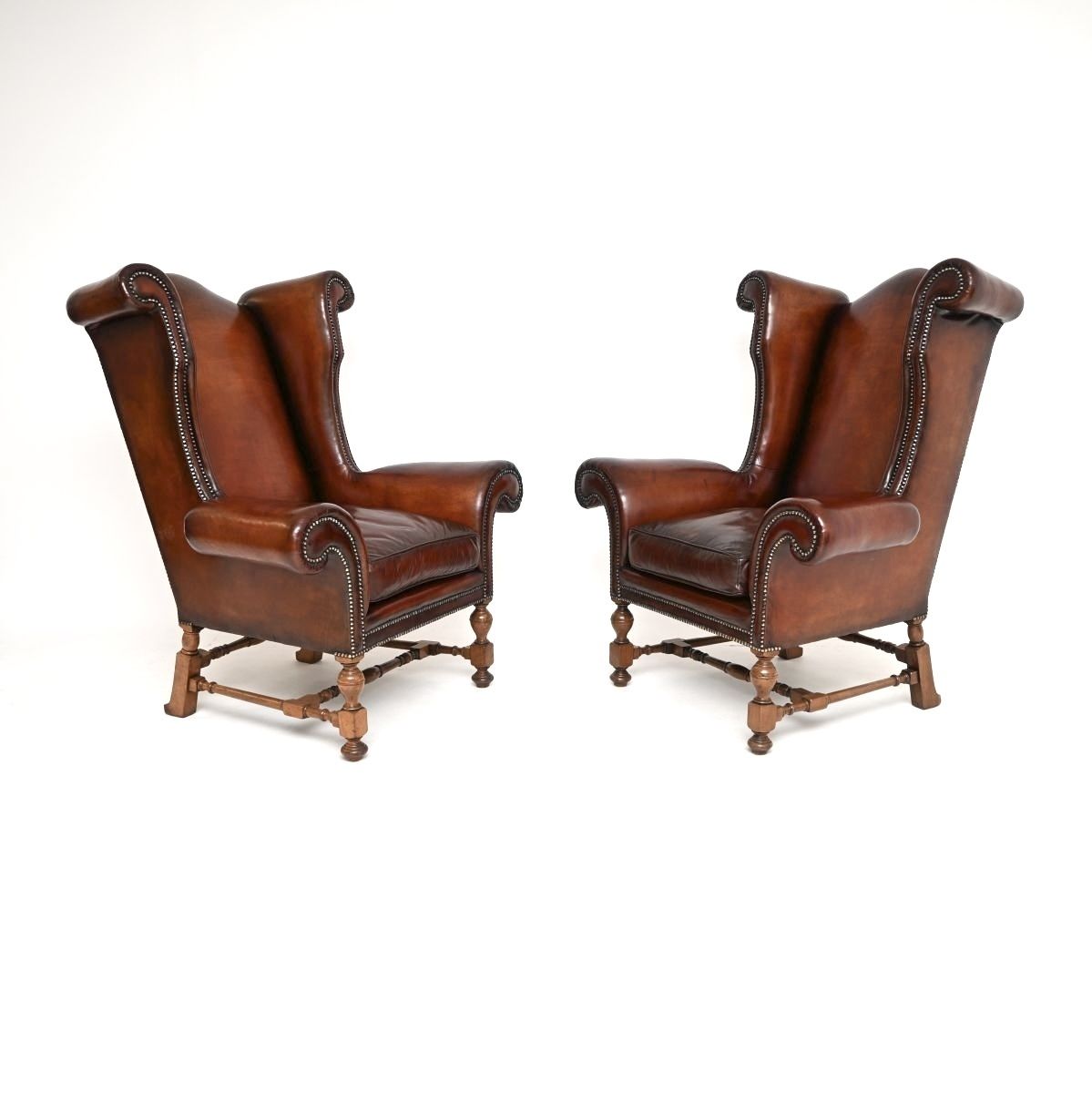 Pair Of Antique Leather Wing Back Armchairs photo furniture