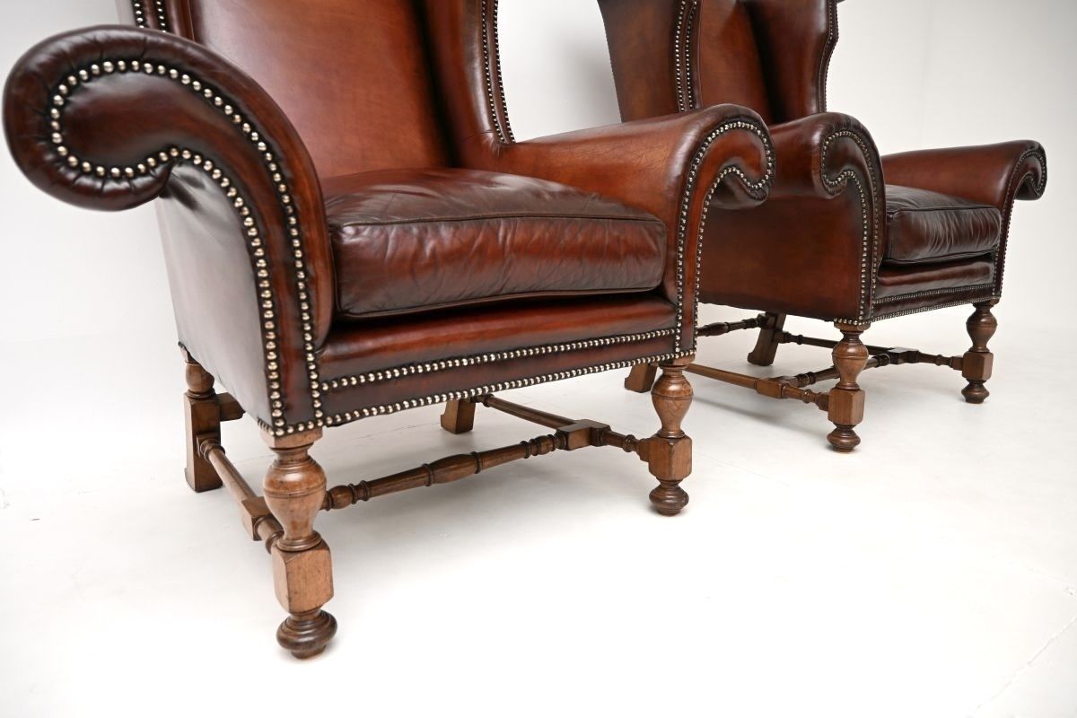 Pair Of Antique Leather Wing Back Armchairs photo vinterior