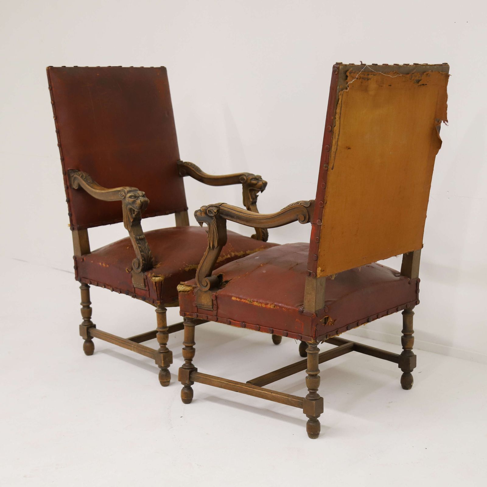 photo vinterior Pair Of French Louis XIV Style Mahogany Lion Head Fauteuils With Distressed Leather