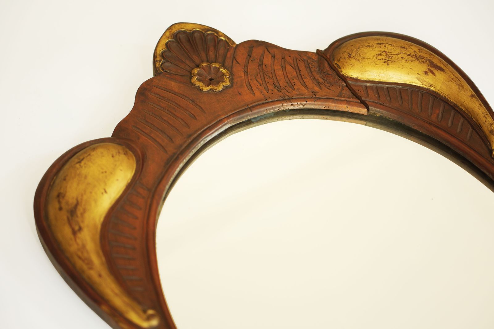 Antique Oval Giltwood Mirror With A Carved Wooden Frame, Eastern Europe, Circa 1900 photo 1590.0