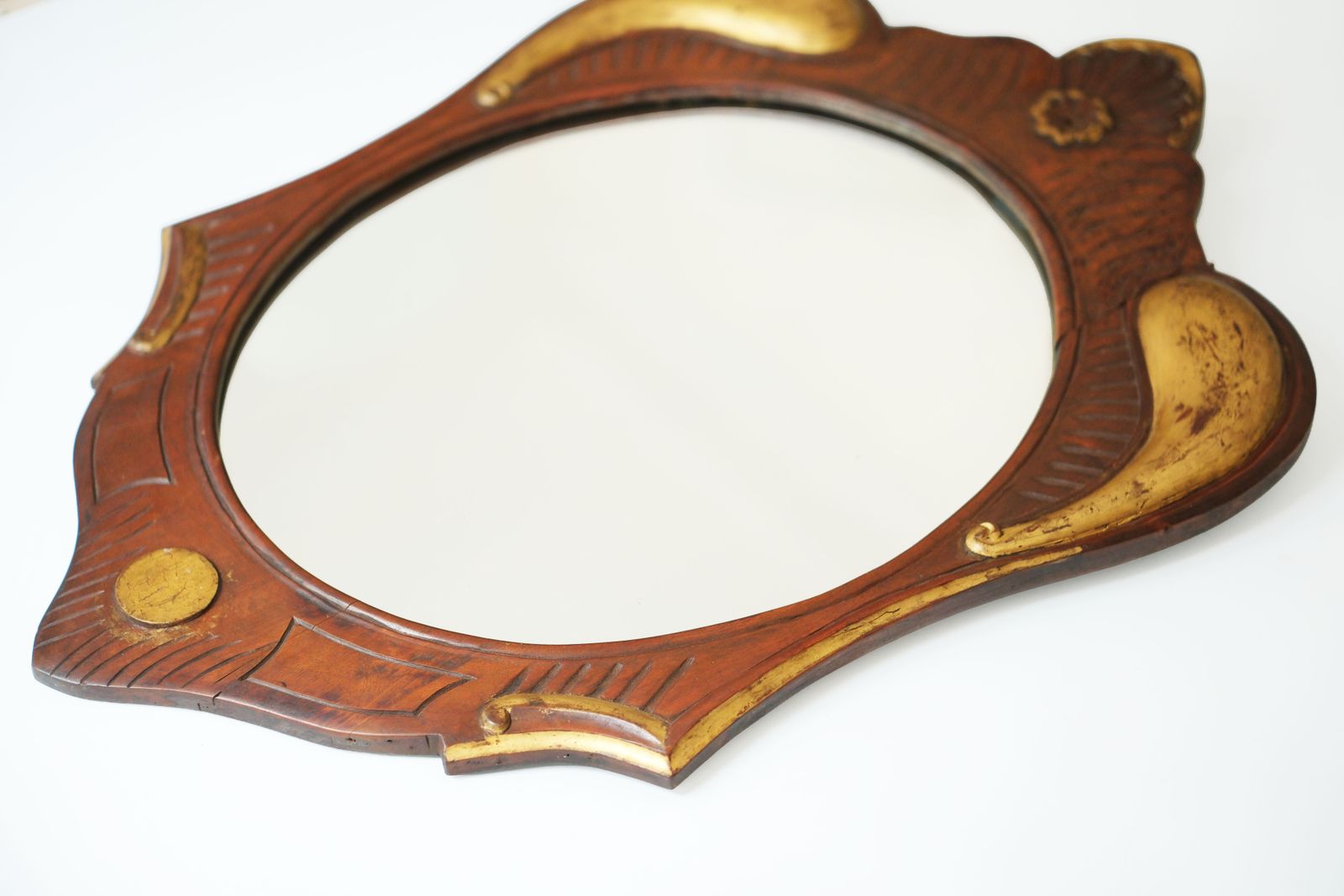 Antique Oval Giltwood Mirror With A Carved Wooden Frame, Eastern Europe, Circa 1900 photo vinterior