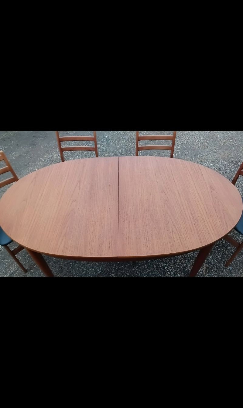 Vintage Teak Extending Dining Table With A Set Of 4 Chairs. photo furniture