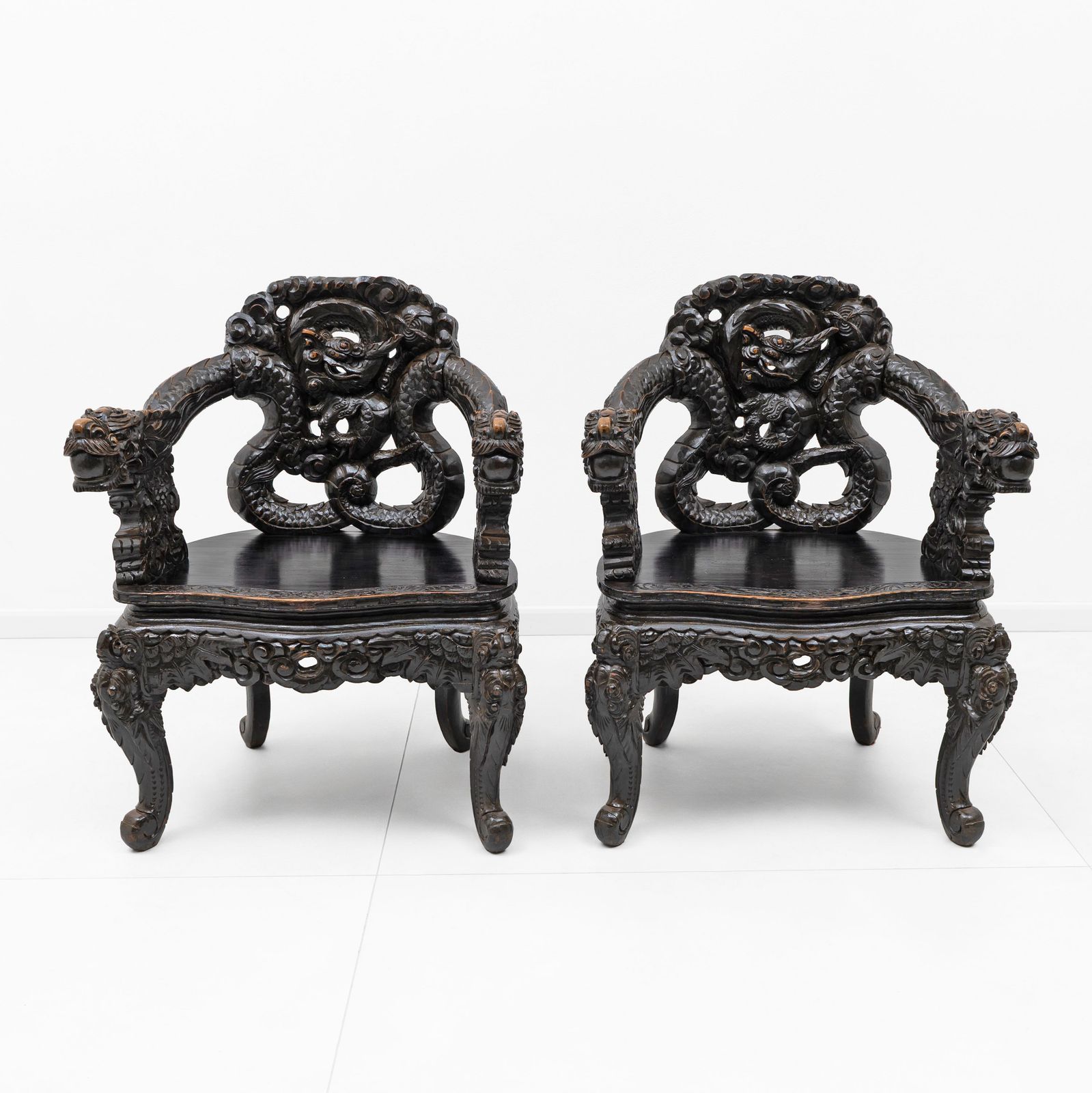 Pair Of Chinese Qing Dynasty Carved Dragon Armchairs, Ebonized Hardwood, 19th photo for sale