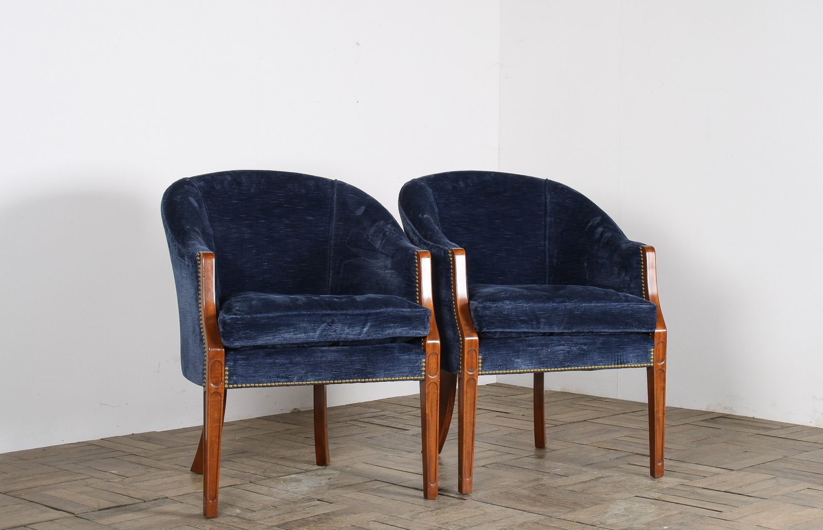 A Pair Of Arthur Brett Tub Chairs In Navy Blue 1980s – Fine English Furniture