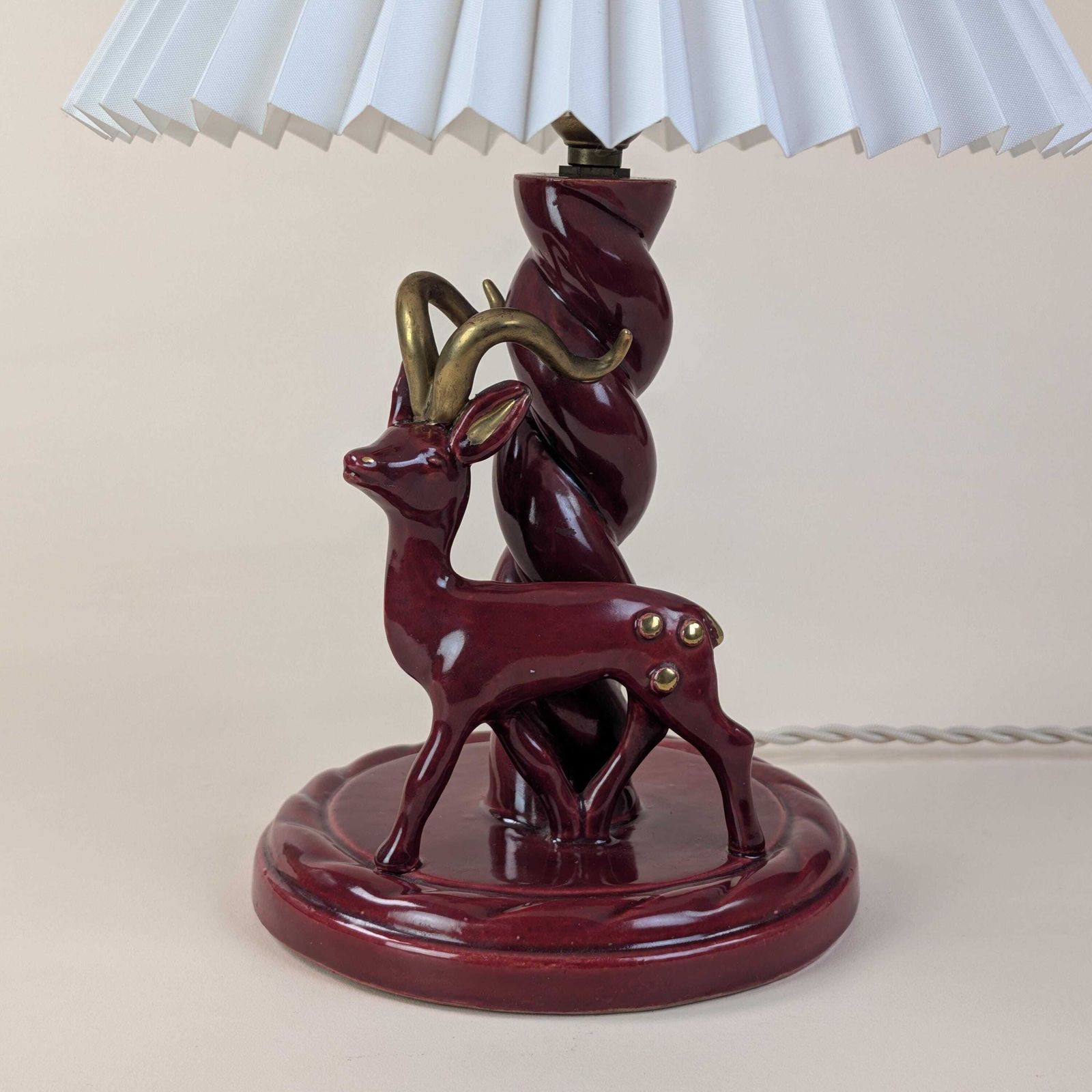 French Art Deco Burgundy Ceramic Gazelle Lamp, Gébé Paris Mid Century Table Light With Pleated Shade photo furniture