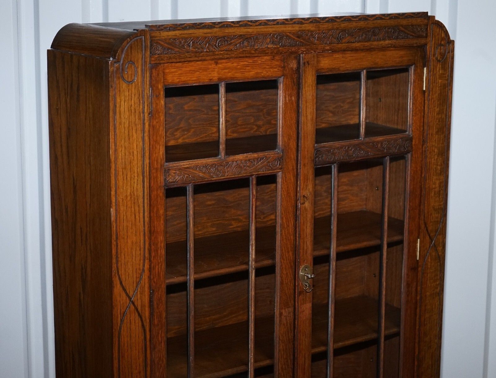 Antique Circa 1920's English Oak Art Deco Carved Bookcase Cabinet photo for sale