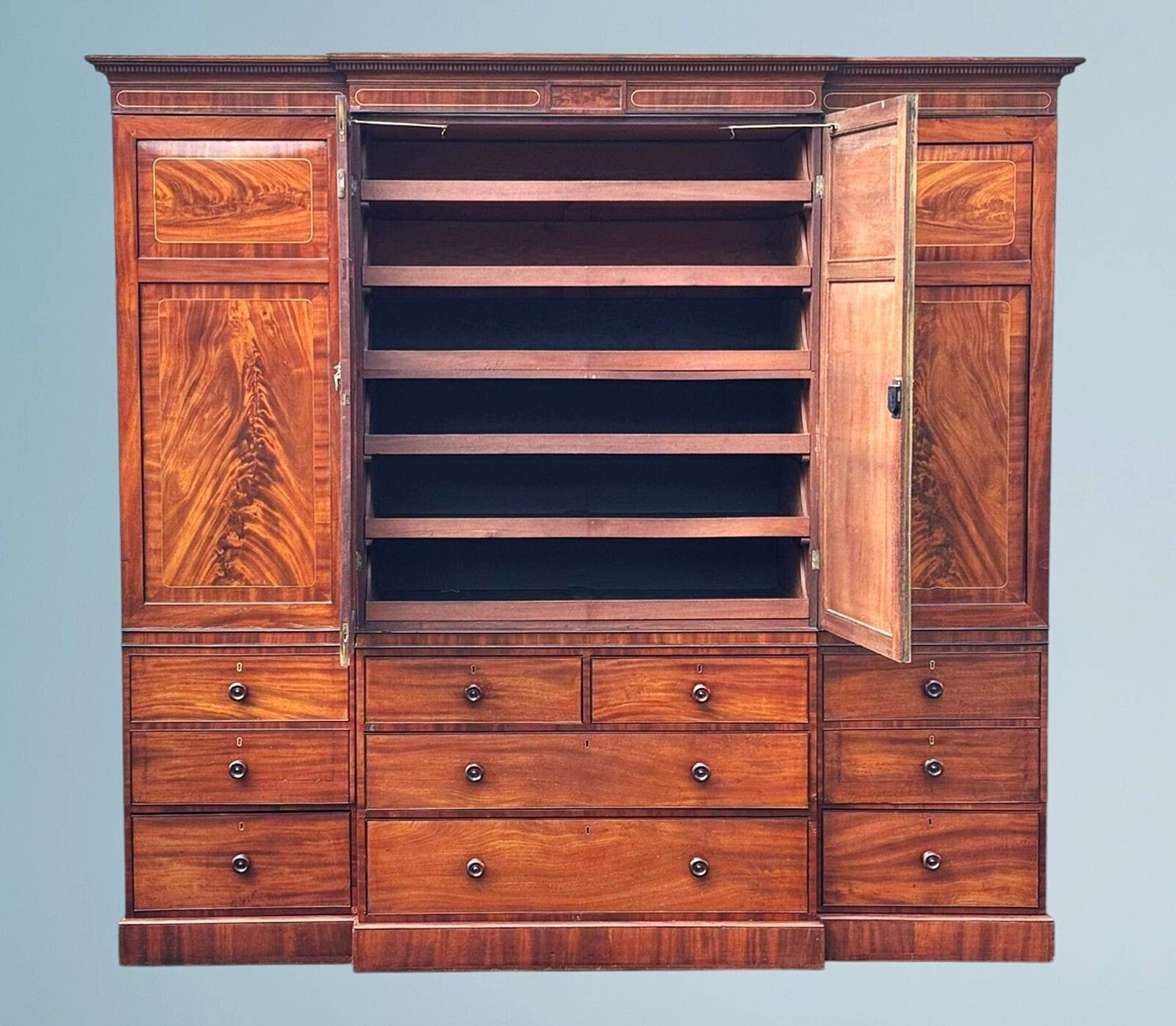 A Large Regency Figured Mahogany Breakfront Wardrobe With Brass Inlaid Decoratio photo 1725.0