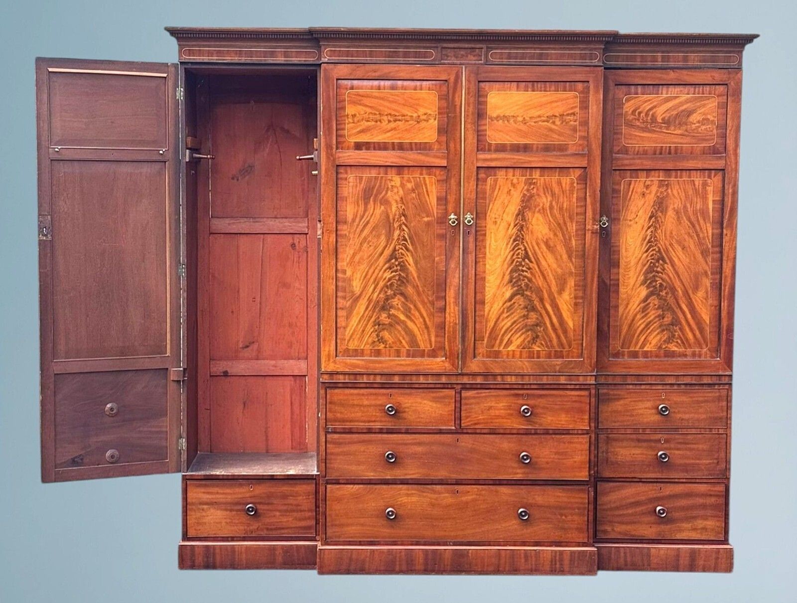 A Large Regency Figured Mahogany Breakfront Wardrobe With Brass Inlaid Decoratio photo vintage