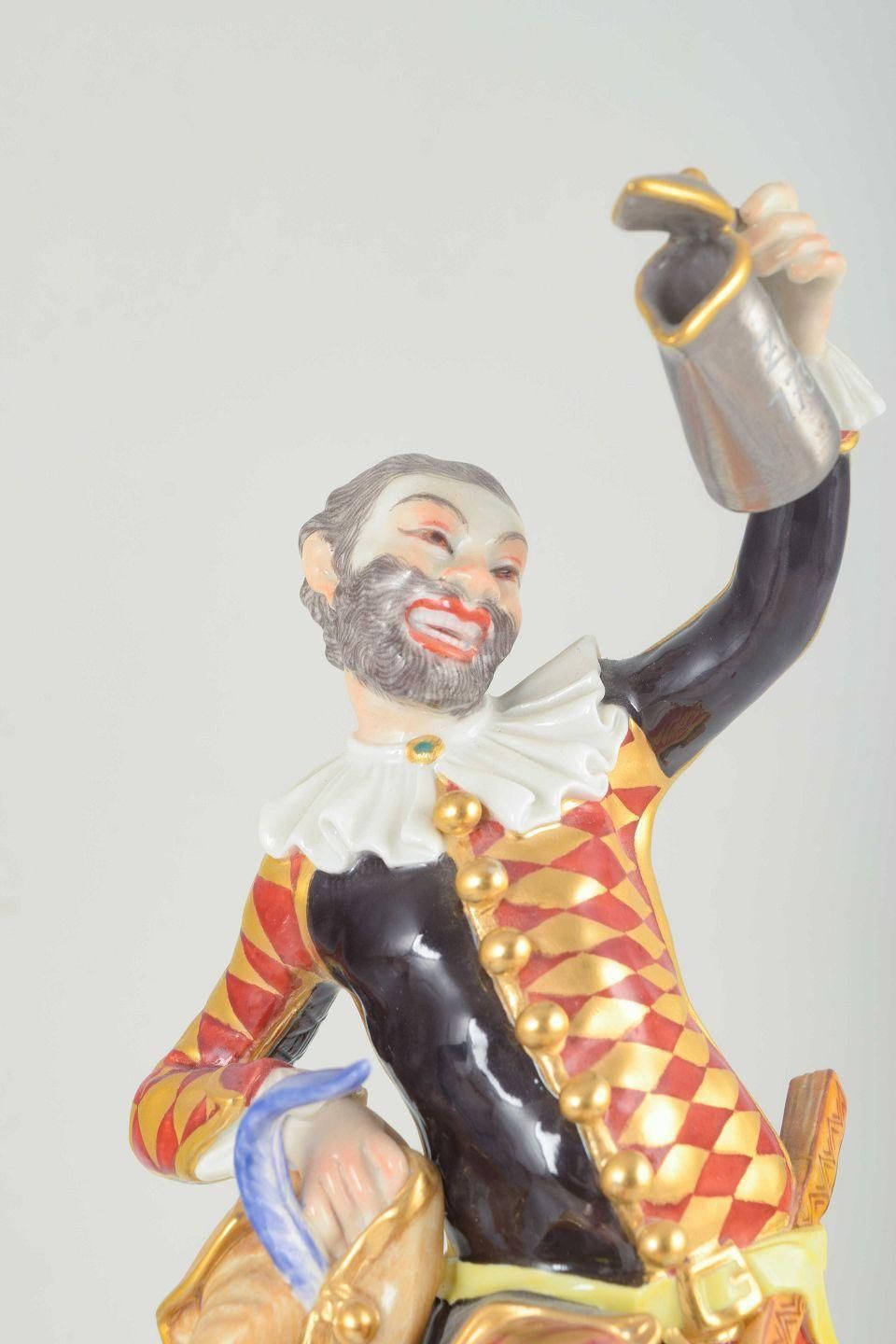 Meissen. Porcelain Figure Of “Harlequin” In A Classic Commedia Dell’arte Costume photo furniture