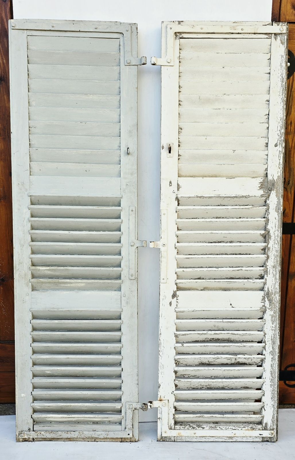 photo furniture A Pair Of Tall Antique French Louvred Shutters