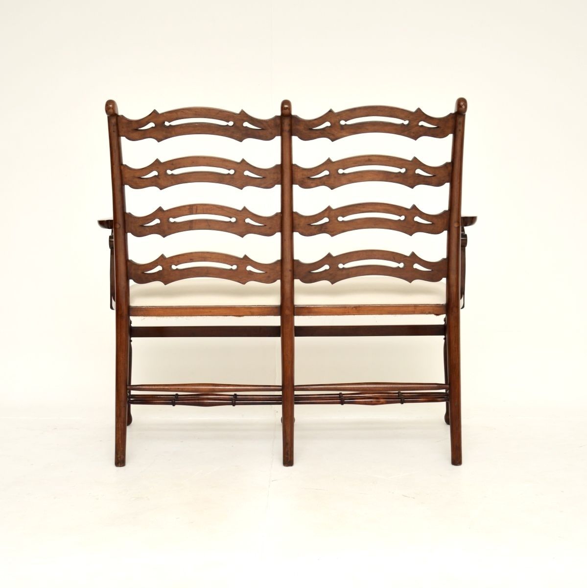 Furniture Antique Mahogany Ladderback Settee photo