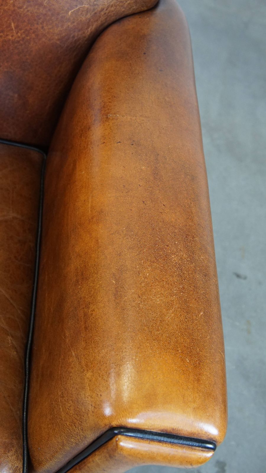 Art Deco Design Armchair In Good Condition With A Sleek Finish And Black Piping. photo 1241.0