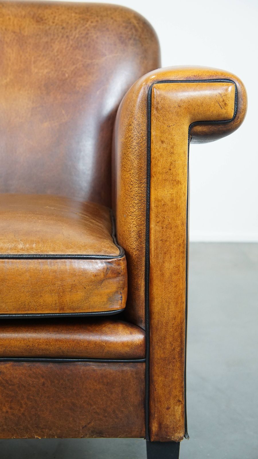 Art Deco Design Armchair In Good Condition With A Sleek Finish And Black Piping. photo vinterior