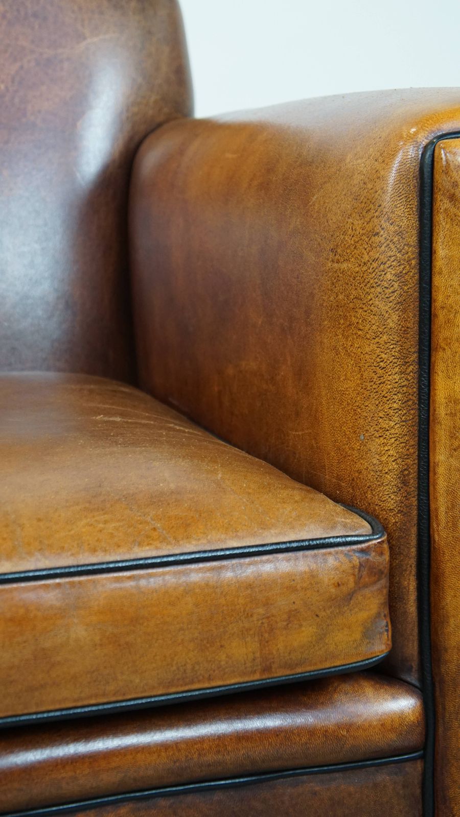 Art Deco Fauteuil In Goede Staat Met Strakke Afwerking En Zwart Bieswerk. photo vintage