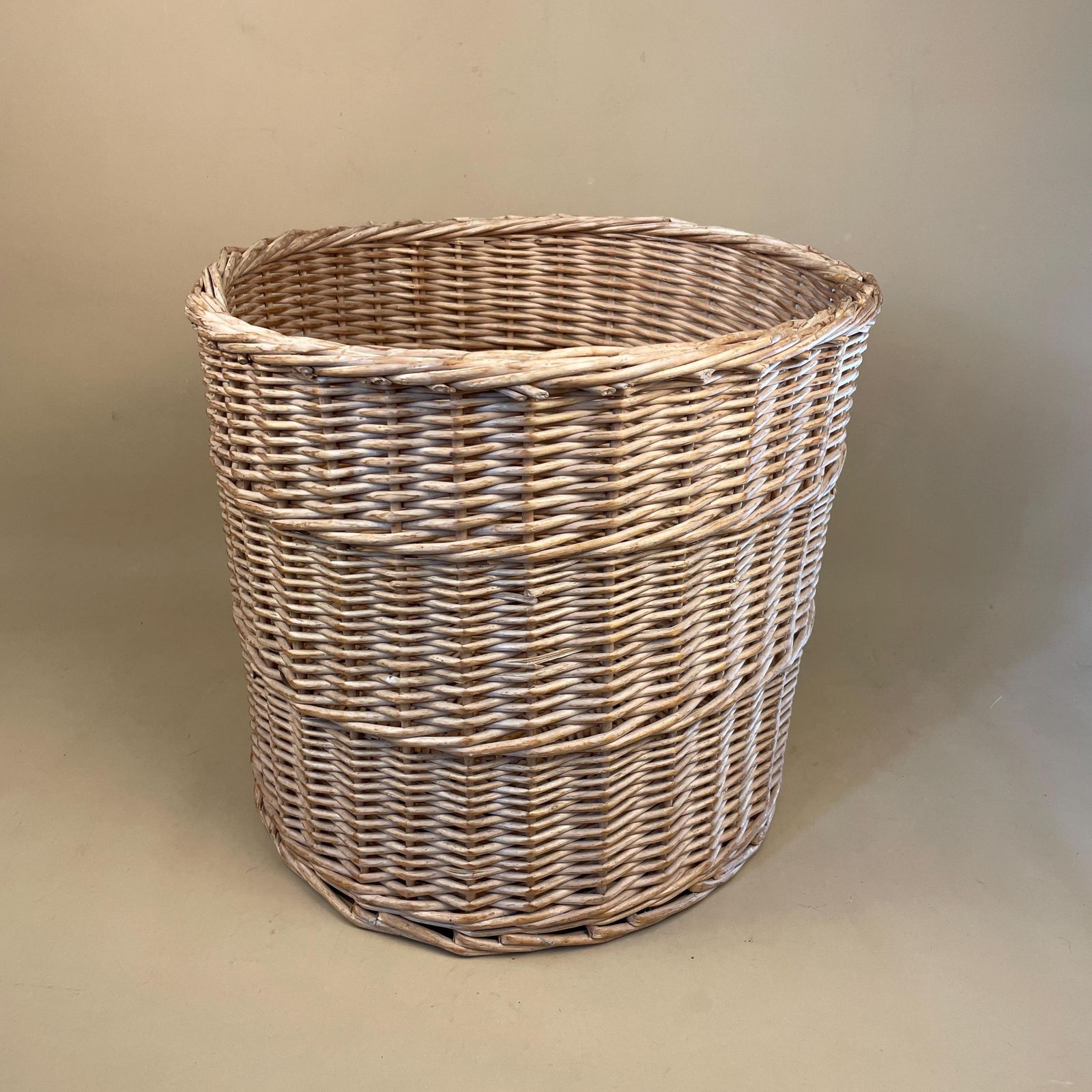 Vintage Round Basket Woven Wicker Brown Antique Cylinder Storage Farmhouse Cottage Decor Laundry Cane Wood Logs Fireplace Pale Striped photo for sale