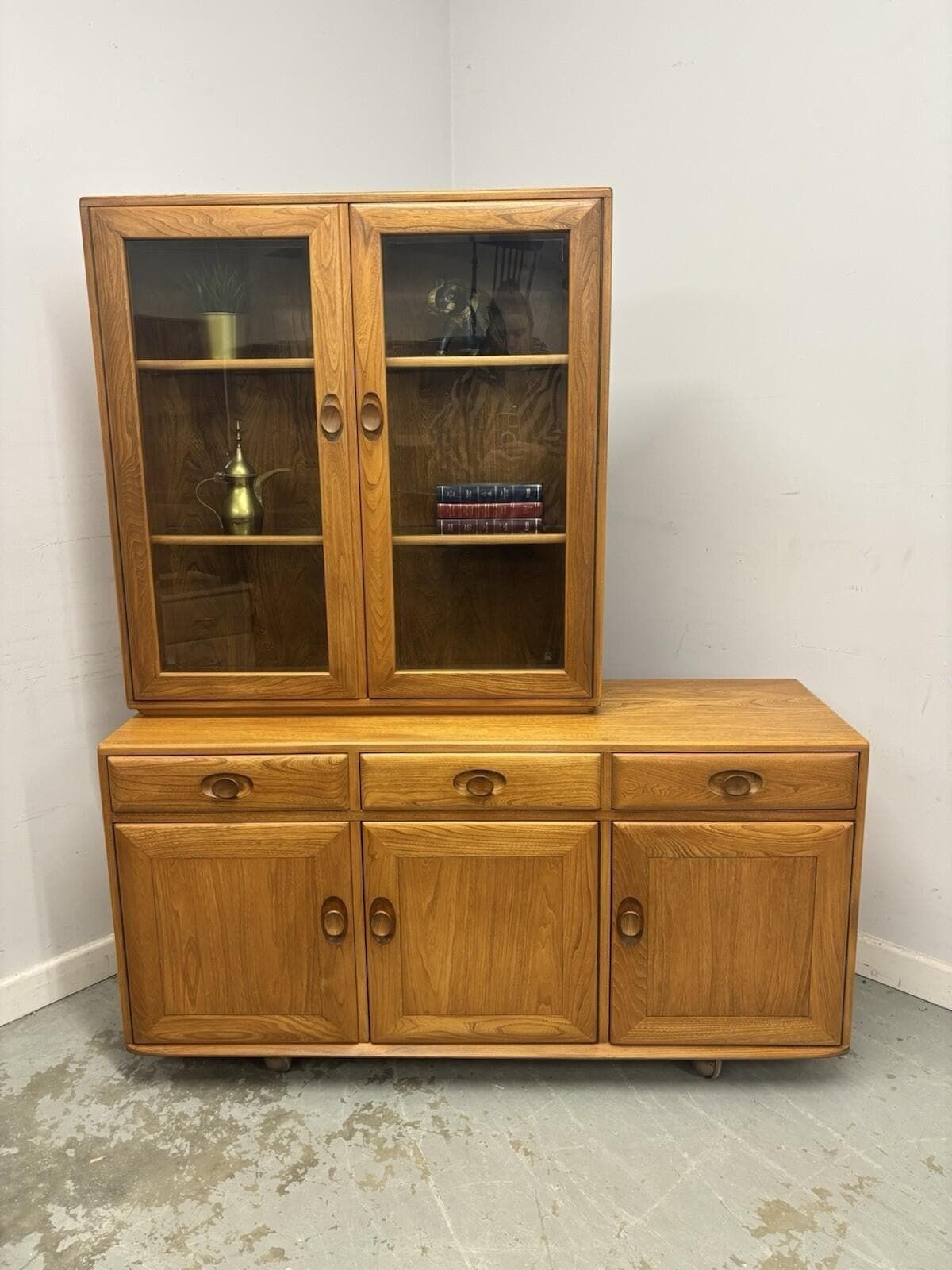 Ercol Windsor Elm Sideboard With Glazed Display Top On Castors – Vintage Cabinet