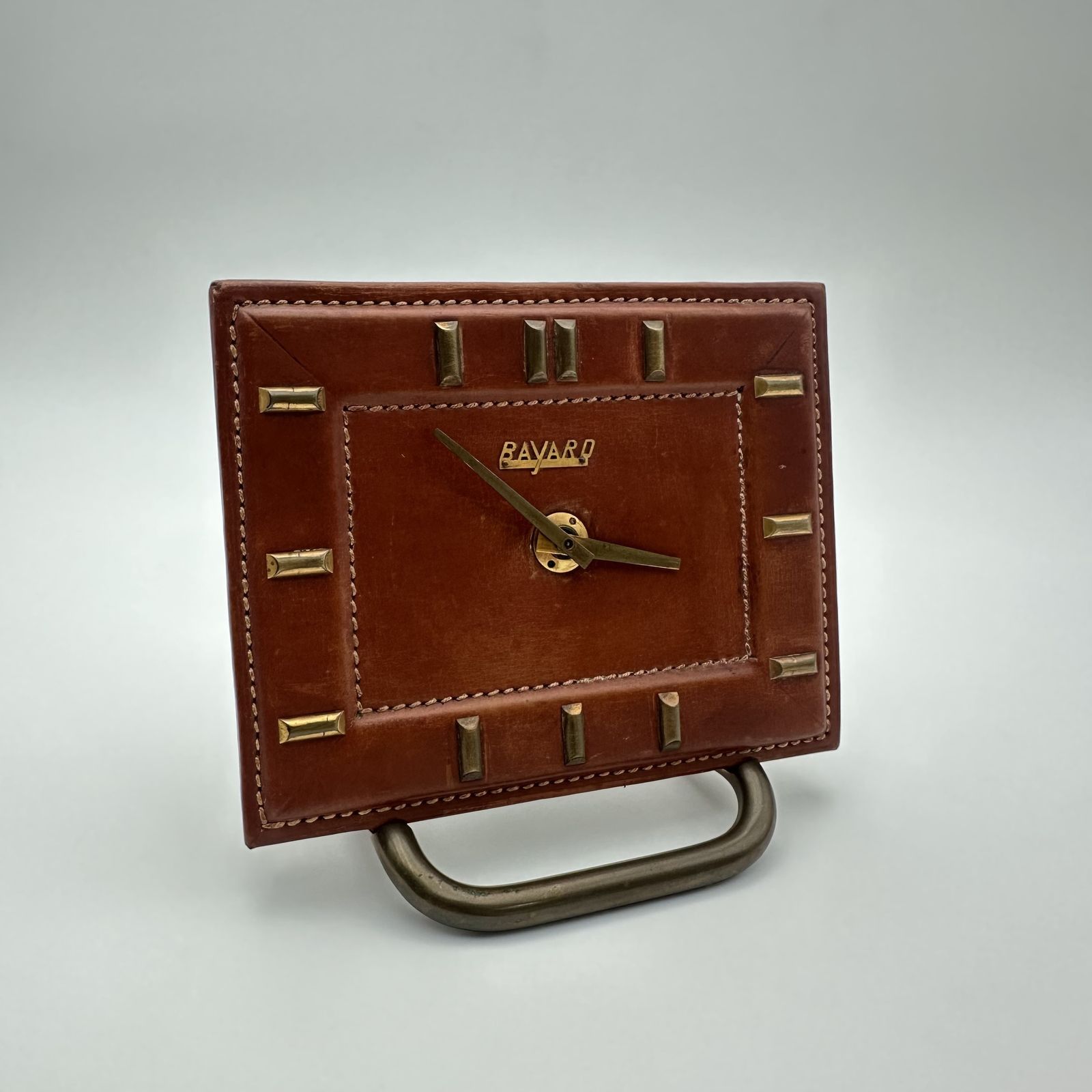 680.0 Bayard Desk Clock In Leather Covered Brass – France, 1953 photo