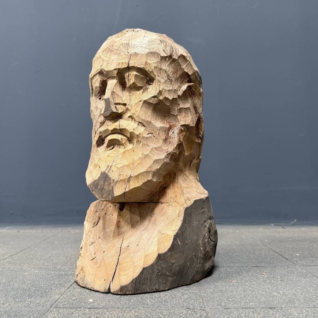 A Wooden Carving Of A Man's Head Or Bust With A Beard photo furniture