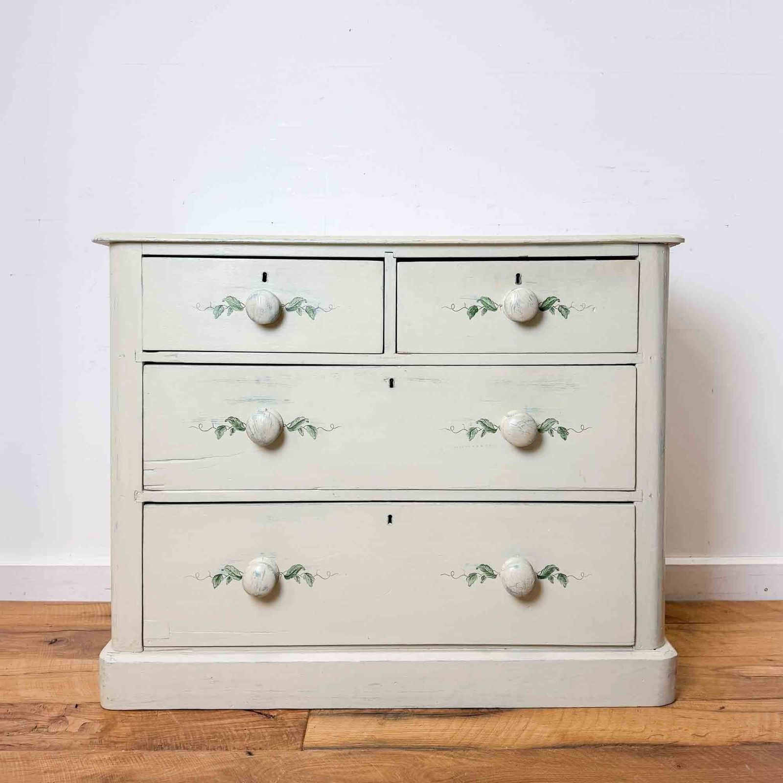 Painted Antique Pine Chest Of Drawers With Leaf Decoration