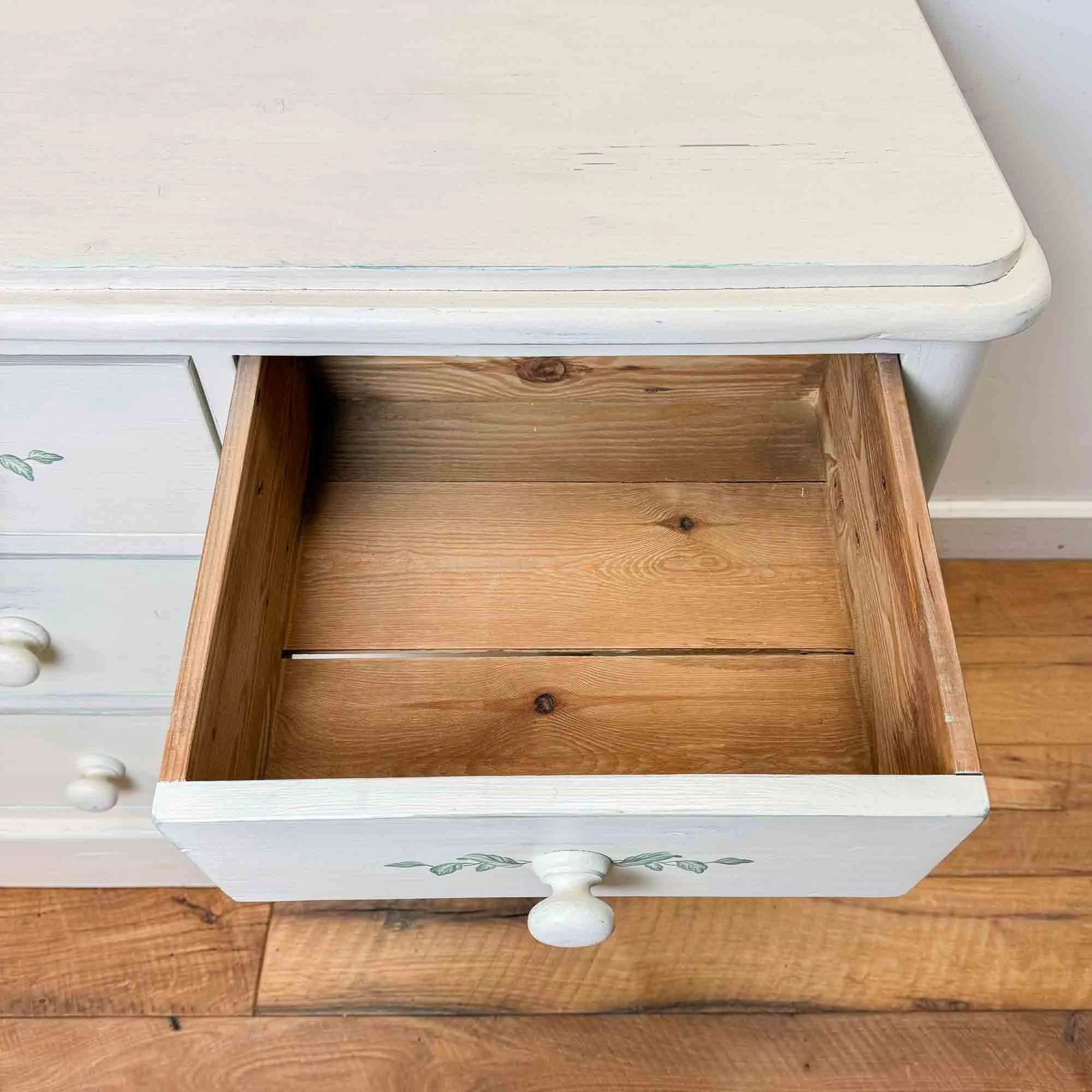 Furniture Vintage Painted Pine Chest Of Drawers With Leaf Decoration photo