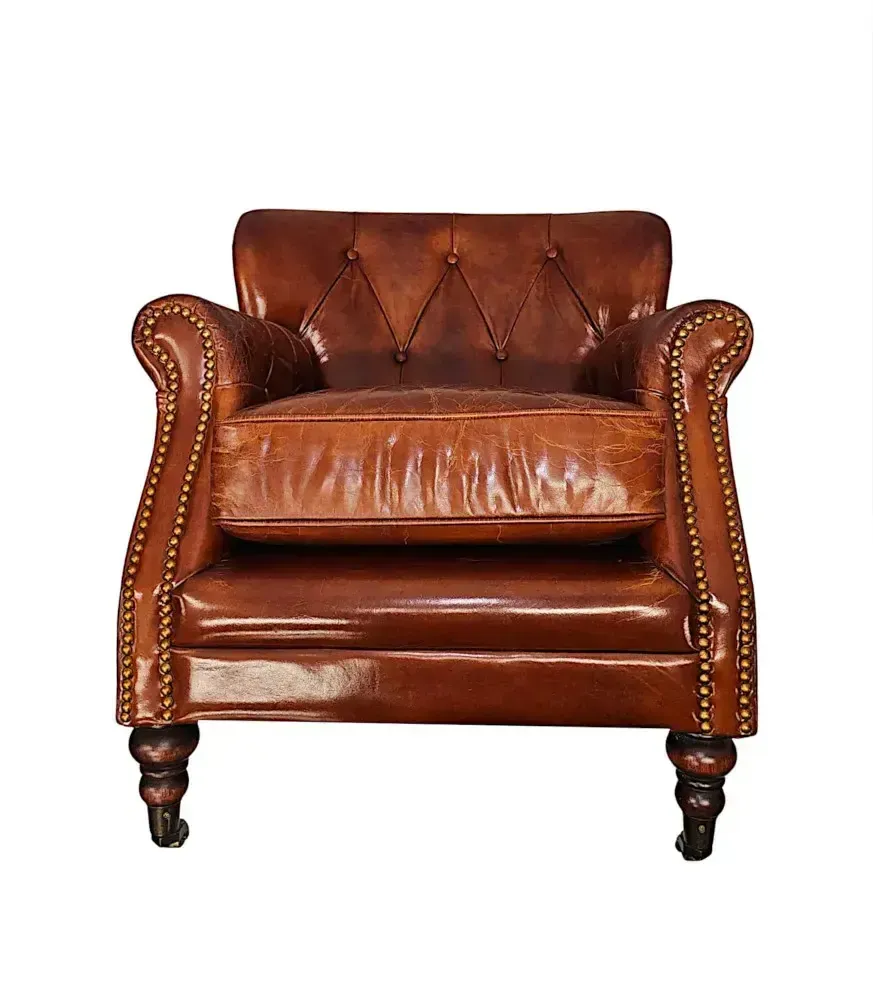 Furniture A Stunning Leather Armchair In The Victorian Manner photo