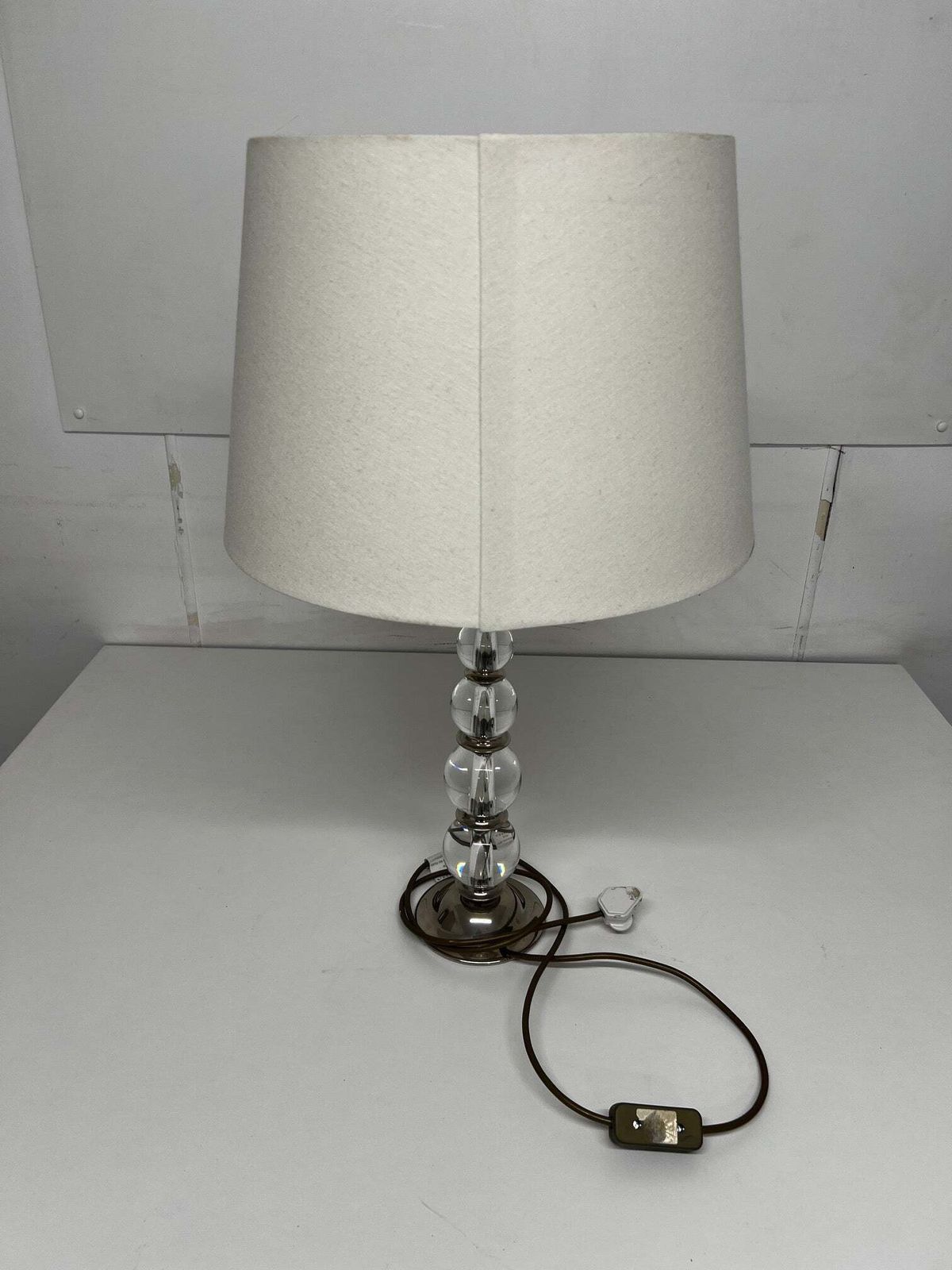 A Pair Of Porta Romana Graduated Glass Ball Lamps With Cream Shade.