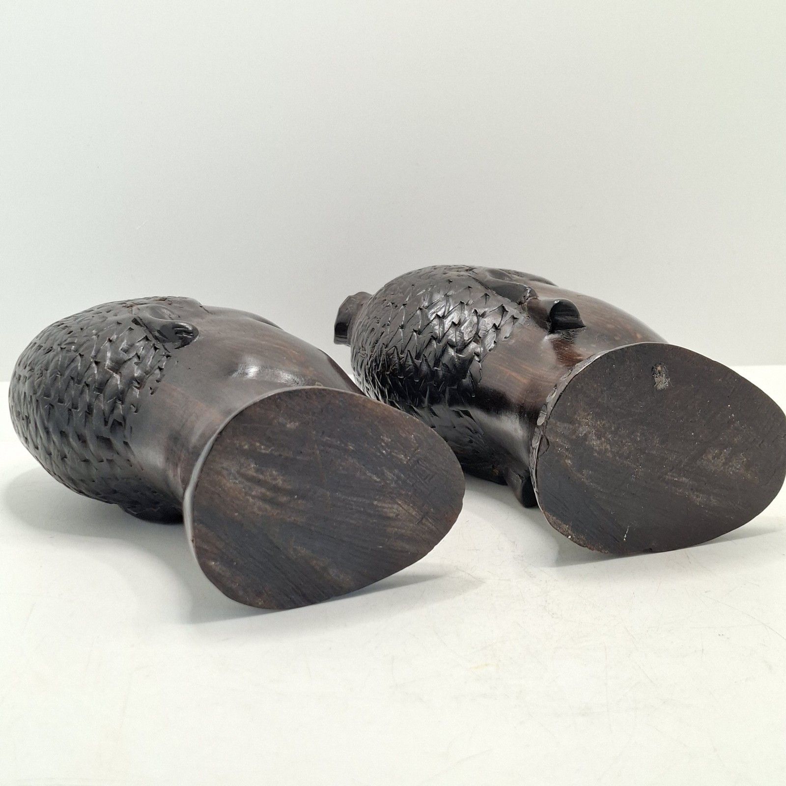 photo furniture Collection Of African Carved Wood Busts Vintage Tribal Ethnographic Decor