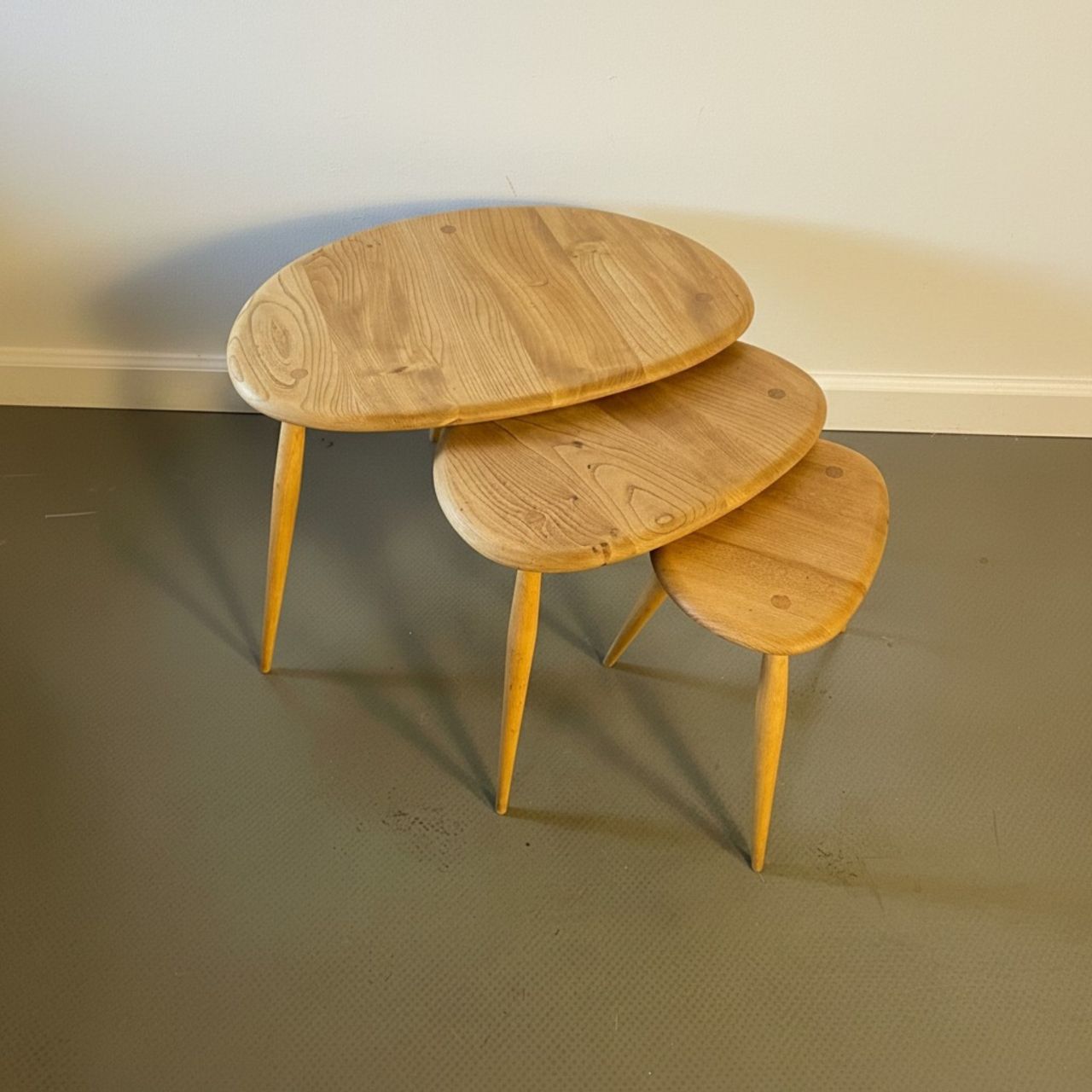 Ercol Nest Of Blonde Pebble Tables photo furniture