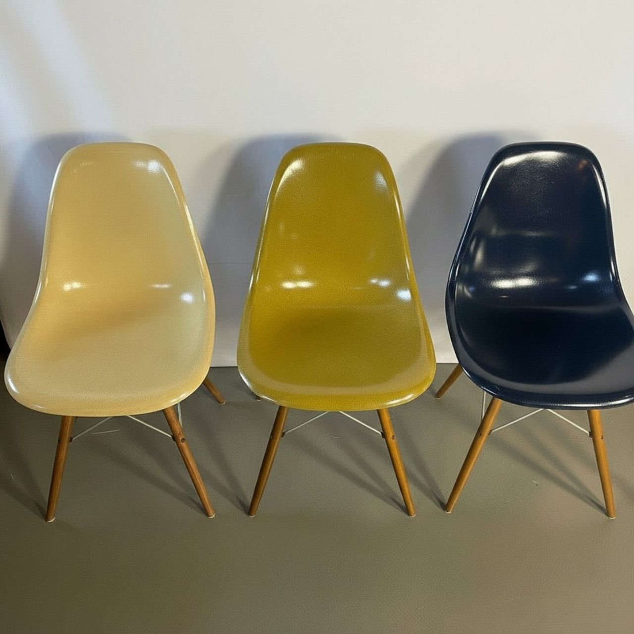 Eames Herman Miller Dsw Side Chairs In Parchment, Navy Blue, Light Olive And Light Ochre With Slight Imperfections photo furniture