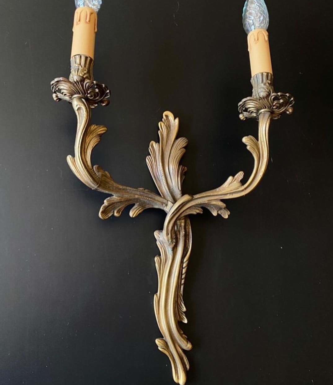Invoervrij voor de VS. Paar antieke bronzen wandlampen photo buy