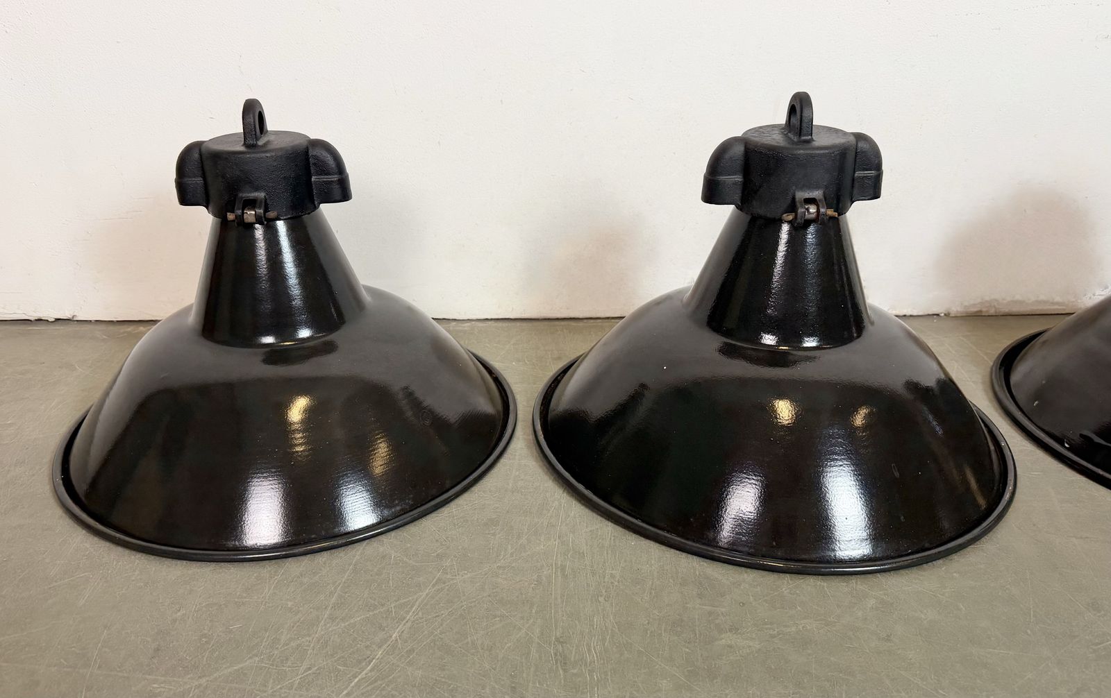 Set Of 4 Industrial Black Enamel Factory Lamps With Cast Iron Top, 1950s, 49x photo for sale