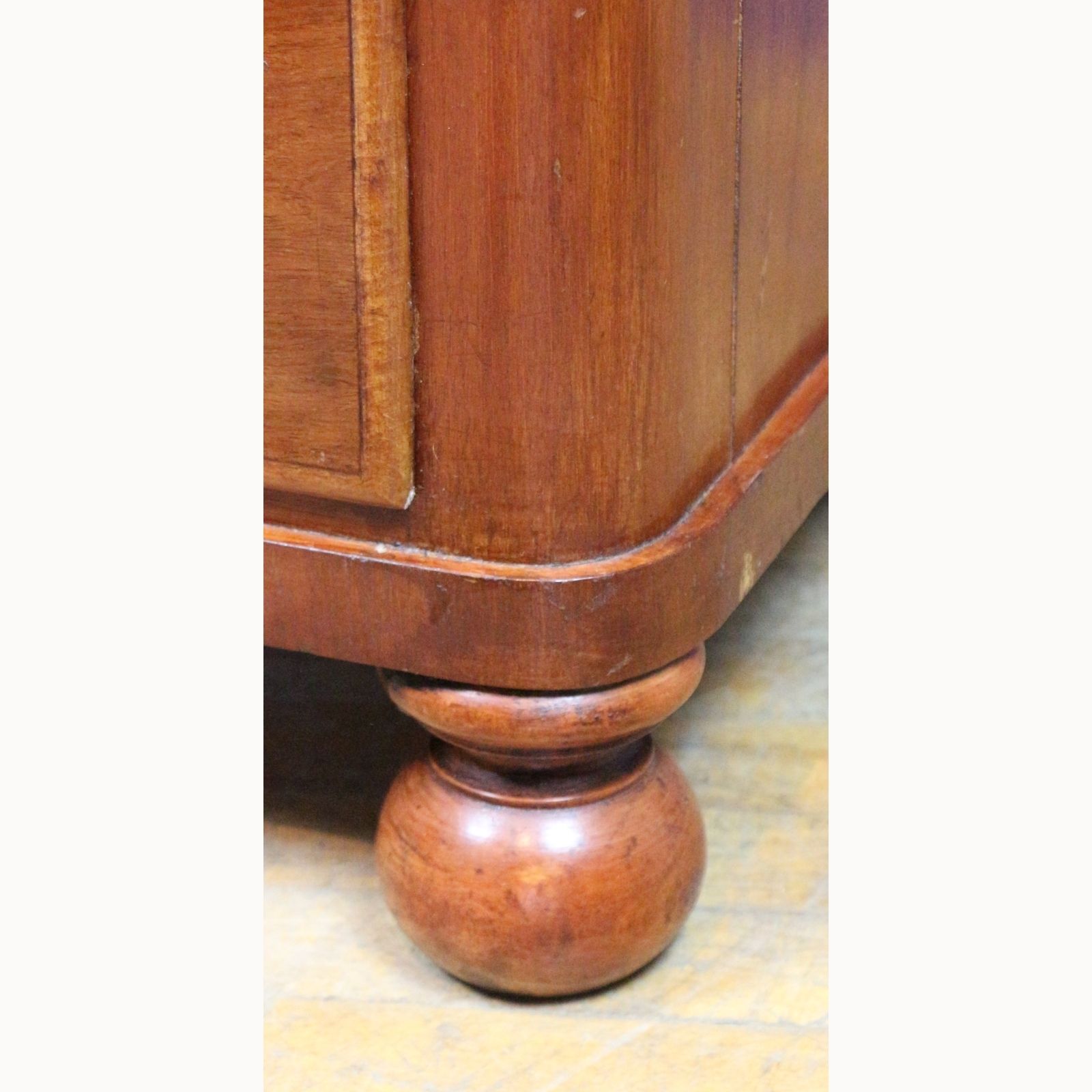 photo furniture A Victorian Mahogany Two Over Two Chest Of Drawers Raised On Bun Feet