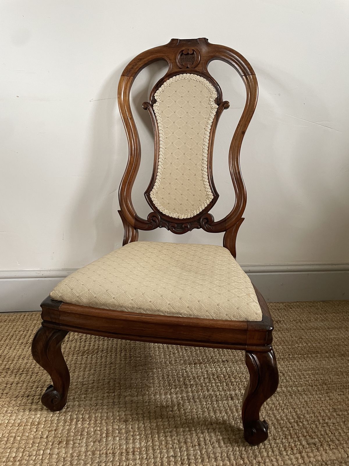 An Antique Carved Nursing Chair