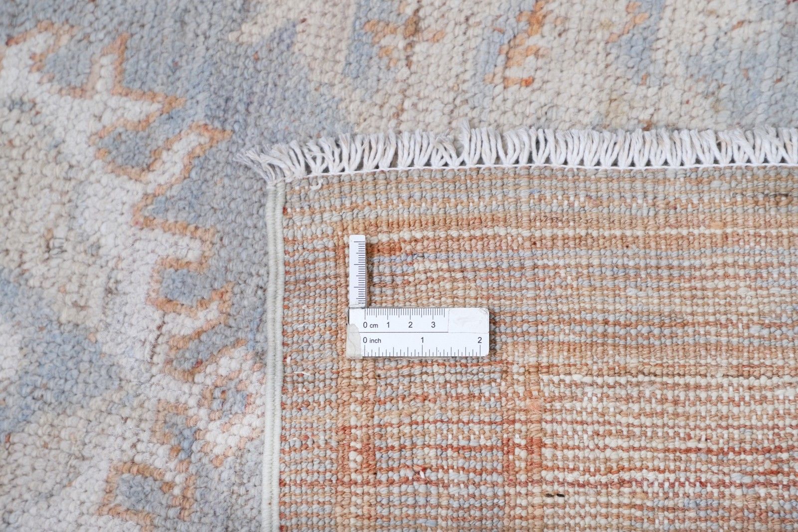 Tapis noué à la main bleu clair et beige aux motifs géométriques pêche doux, 188 x 272 cm photo buy