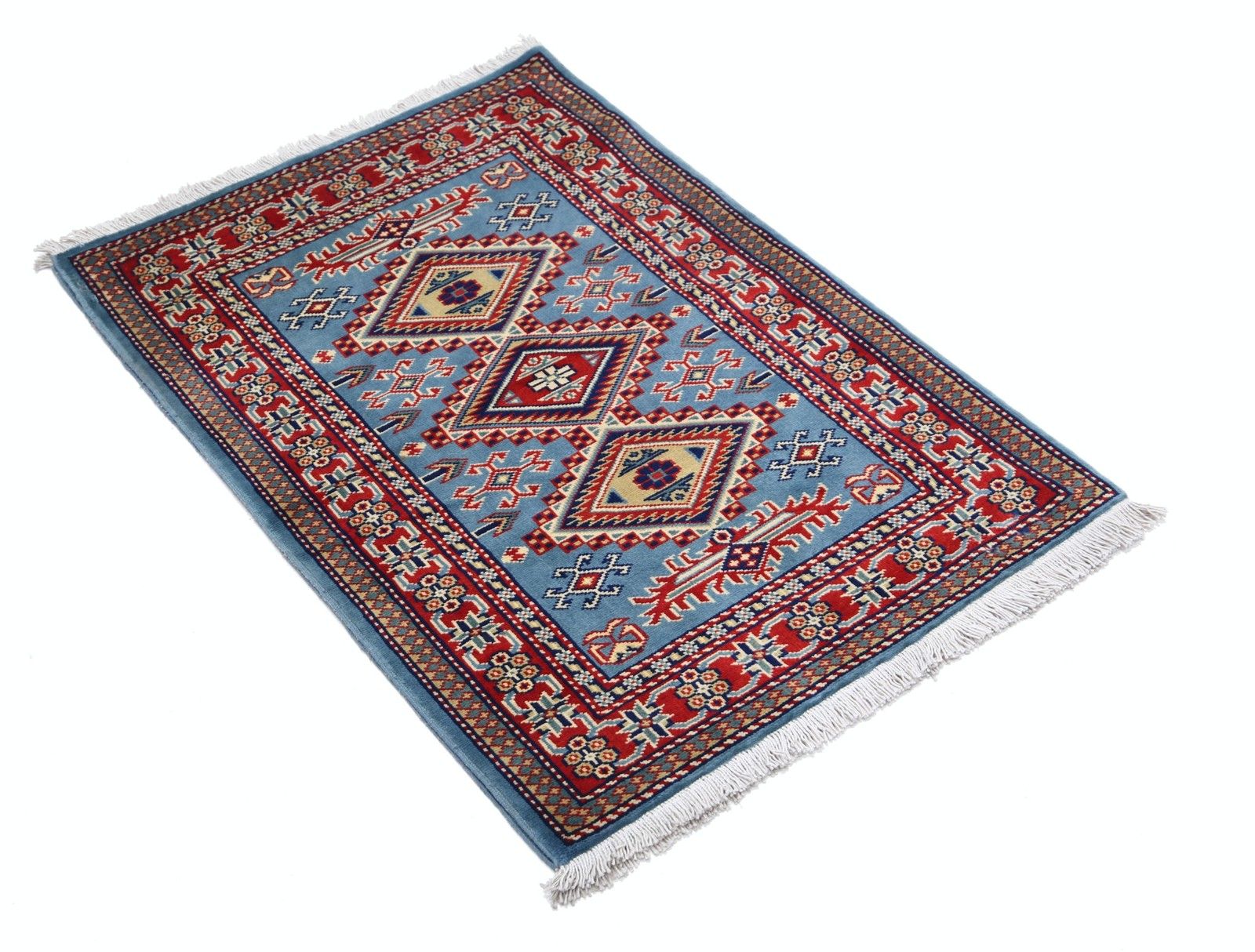 Tapis d'accent en laine fait main, bleu, rouge et ivoire, motif médaillon géométrique, 60 x 90 cm photo furniture