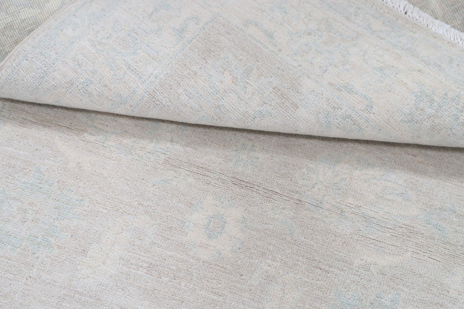 3x4,8 ft handgeknoopt wollen vloerkleed in beige en lichtblauw met bloemmotief photo Textiel