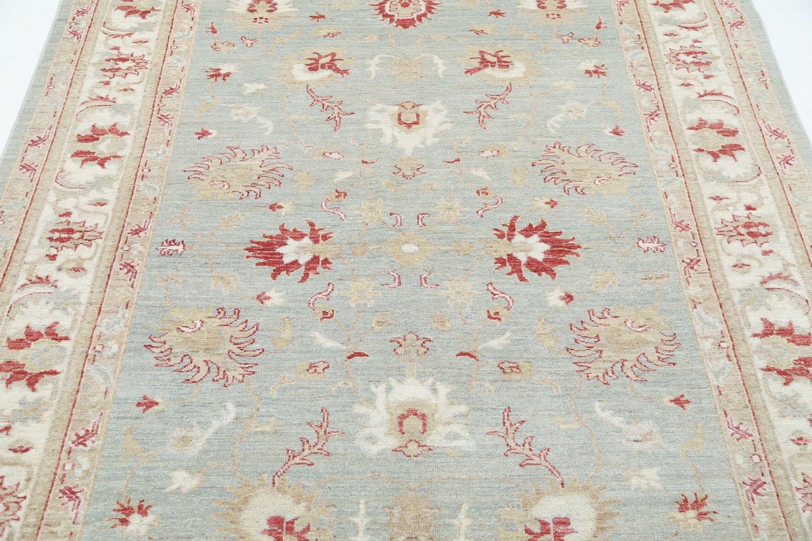 Tapis en laine noué à la main, bleu clair et beige, à motifs floraux, 1,61 x 2,42 m photo 2042.0