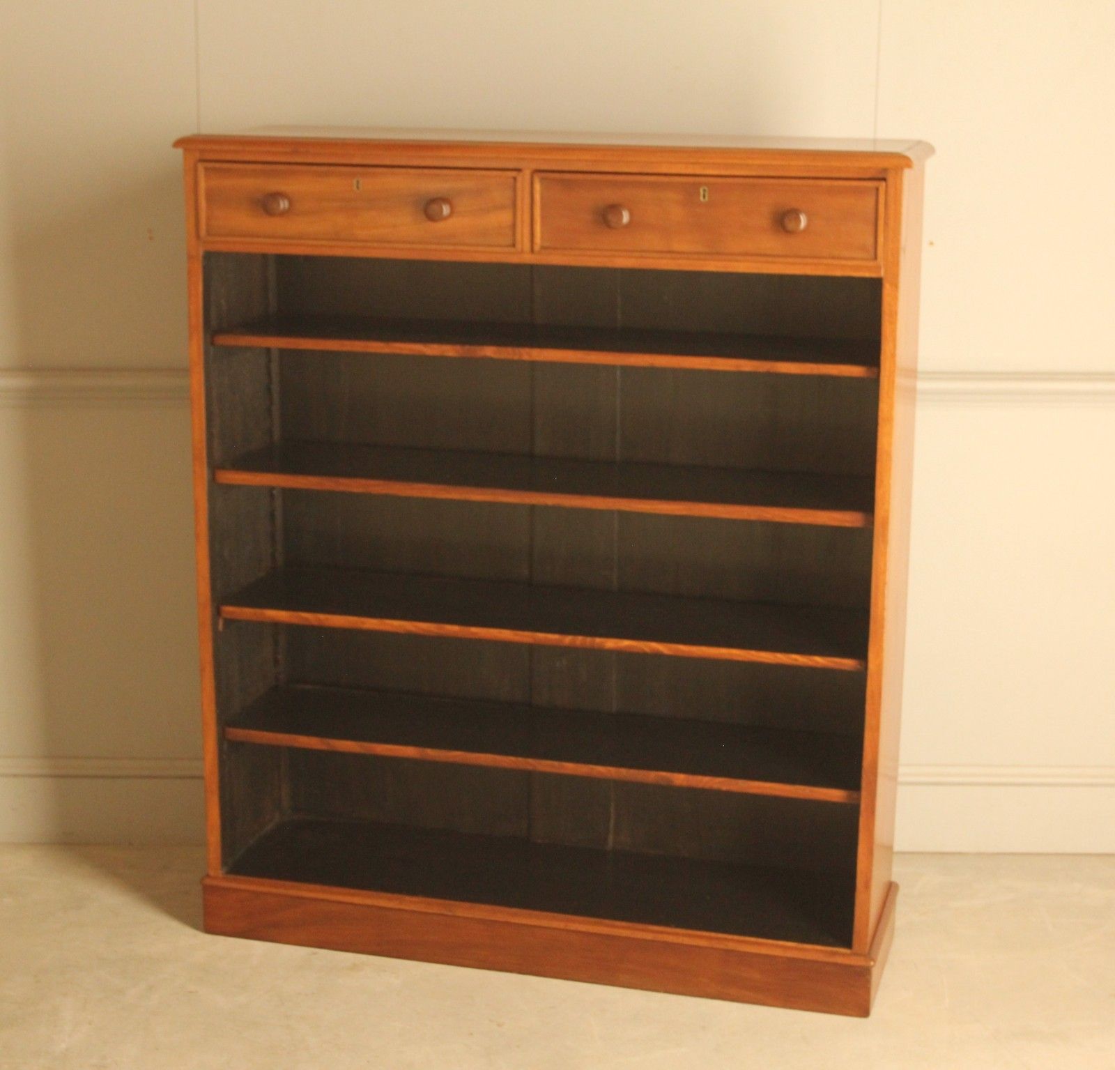 A Handsome 19th‑Century Mahogany Tall Open Bookcase photo for sale