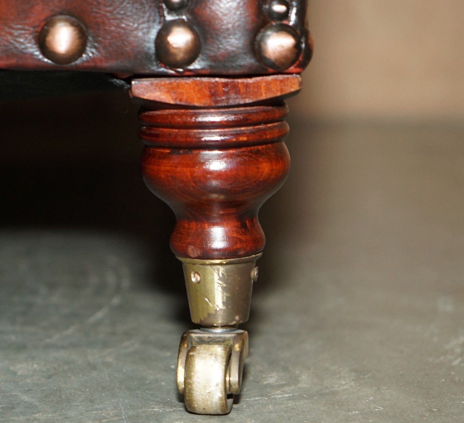 photo furniture Fully Restored Victorian Style Brown Leather Armchair With English Brass Castors