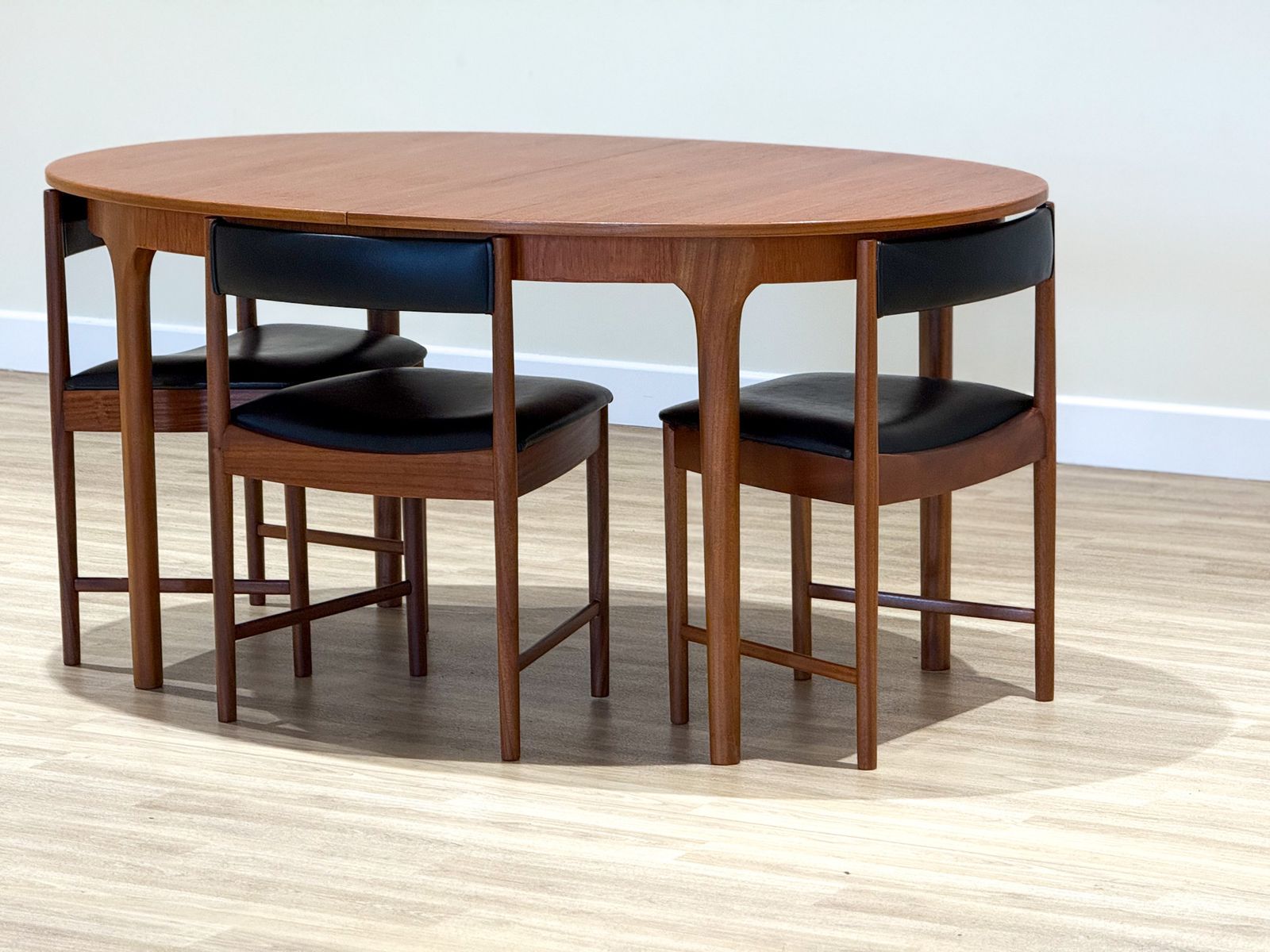 A McIntosh Extending Oval Dining Set By Tom Robertson — Dunvegan Collection, 1960s photo vinterior