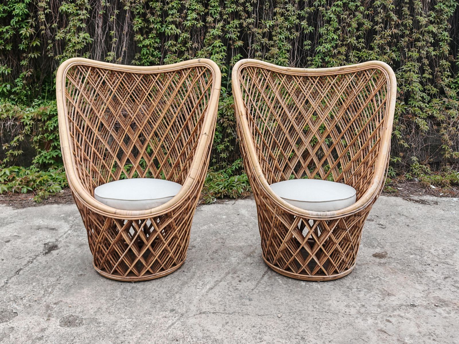 photo furniture Pair Of Mid‑Century Bamboo And Rattan High‑Back Sculptural Lounge Chairs, Italy