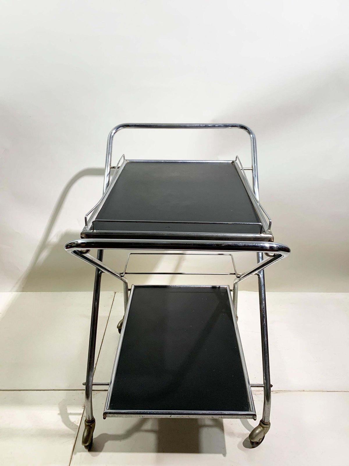 Mid 20th Century Folding Bar Cart In Chrome And Black By Richard, Circa 1960's photo vintage