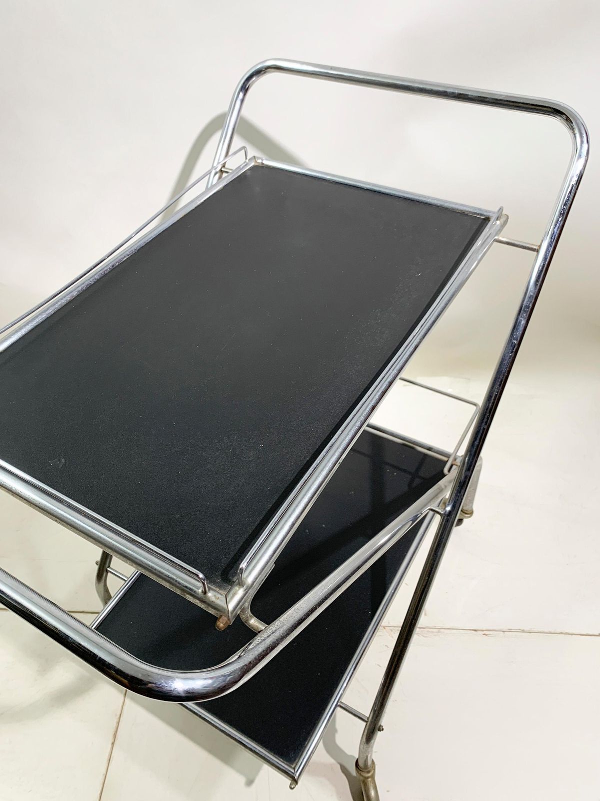 photo for sale Mid 20th Century Folding Bar Cart In Chrome And Black By Richard, Circa 1960's
