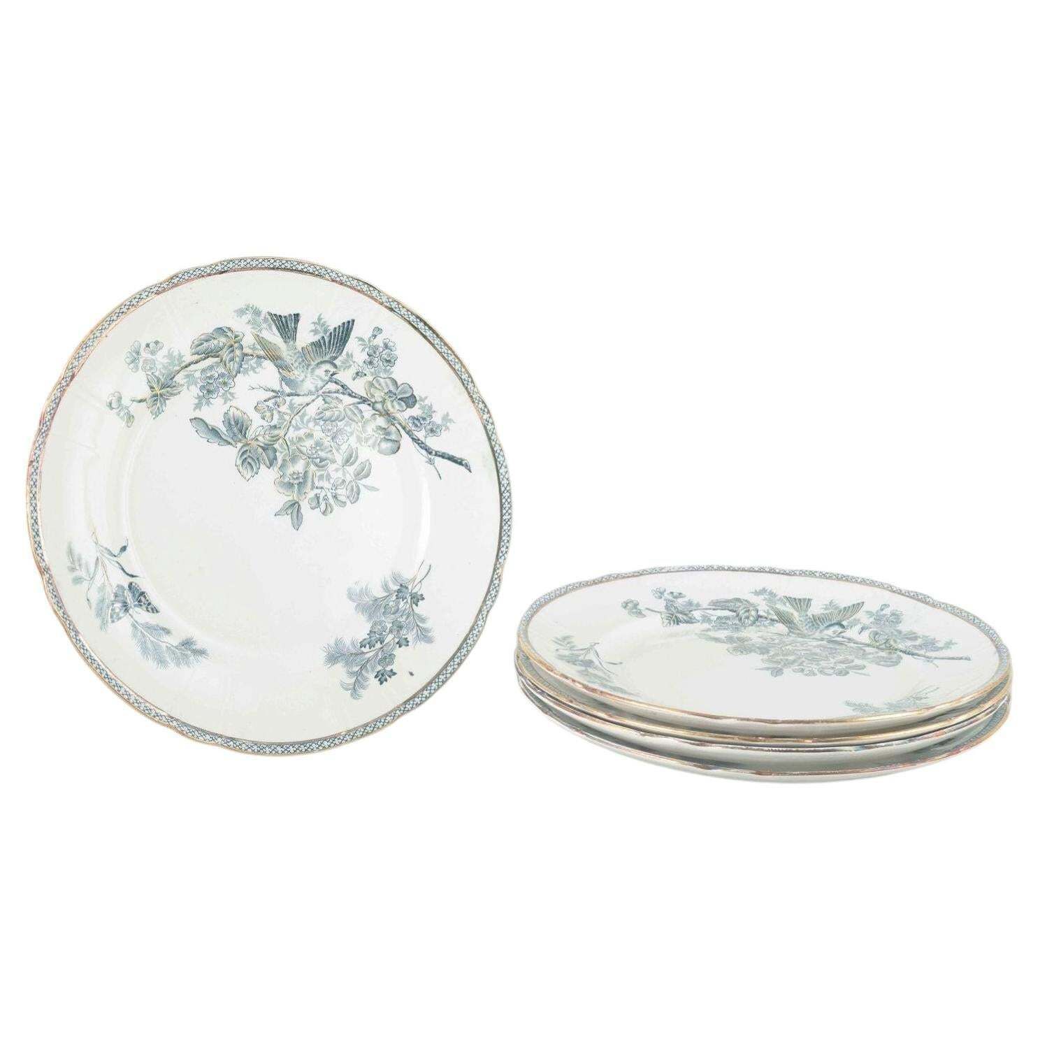 Gustavsberg, « Wexiö ». Cinq assiettes plates en faïence à décor imprimé.