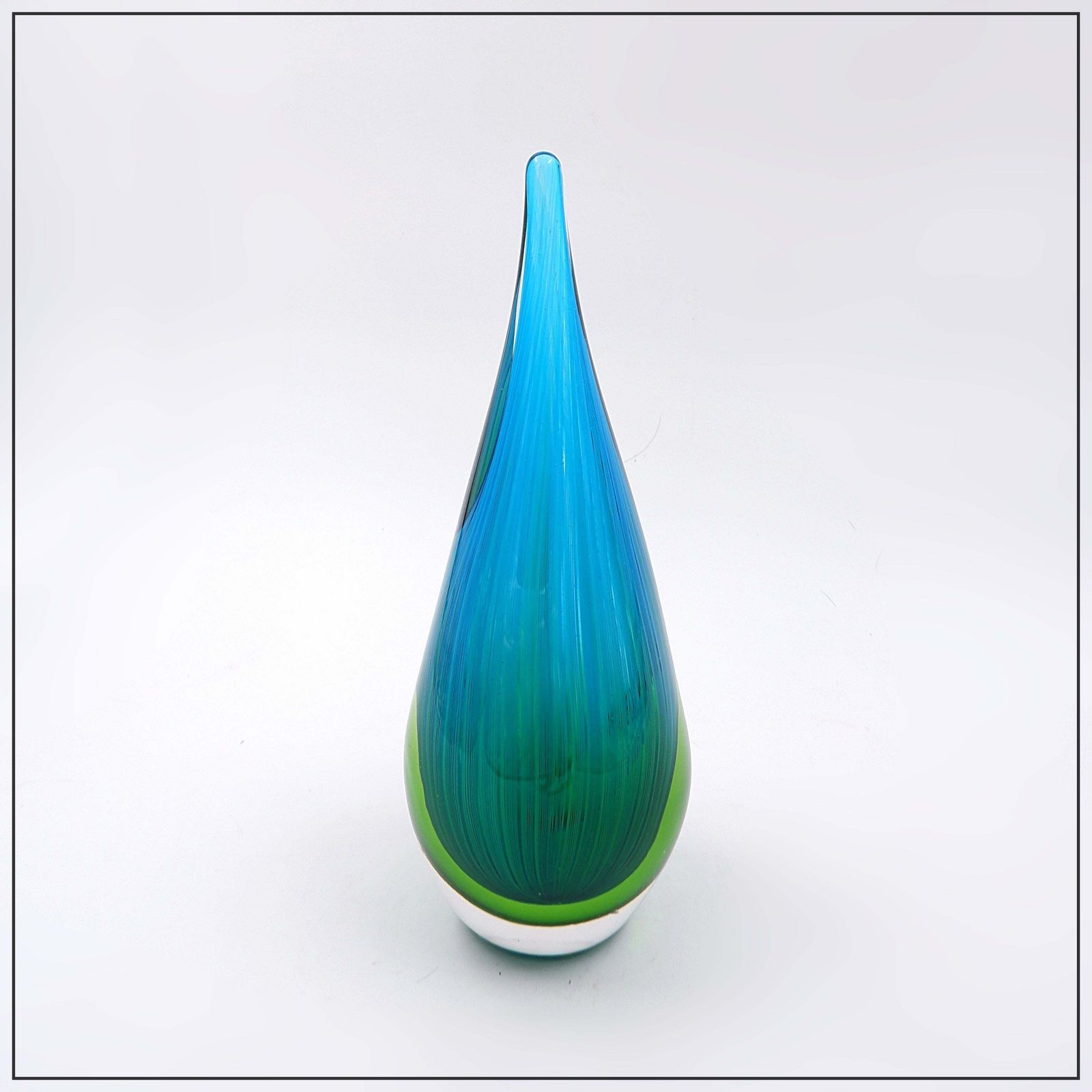 Art Glass Sculpture In The Shape Of A Teardrop In Shades Of Blue And Green photo furniture