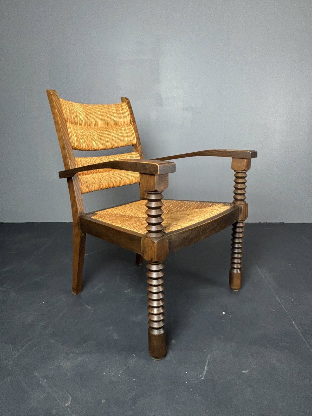 Fauteuil à pieds tournés en jonc, dans le style de Charles Dudouyt, France, années 1950 photo for sale