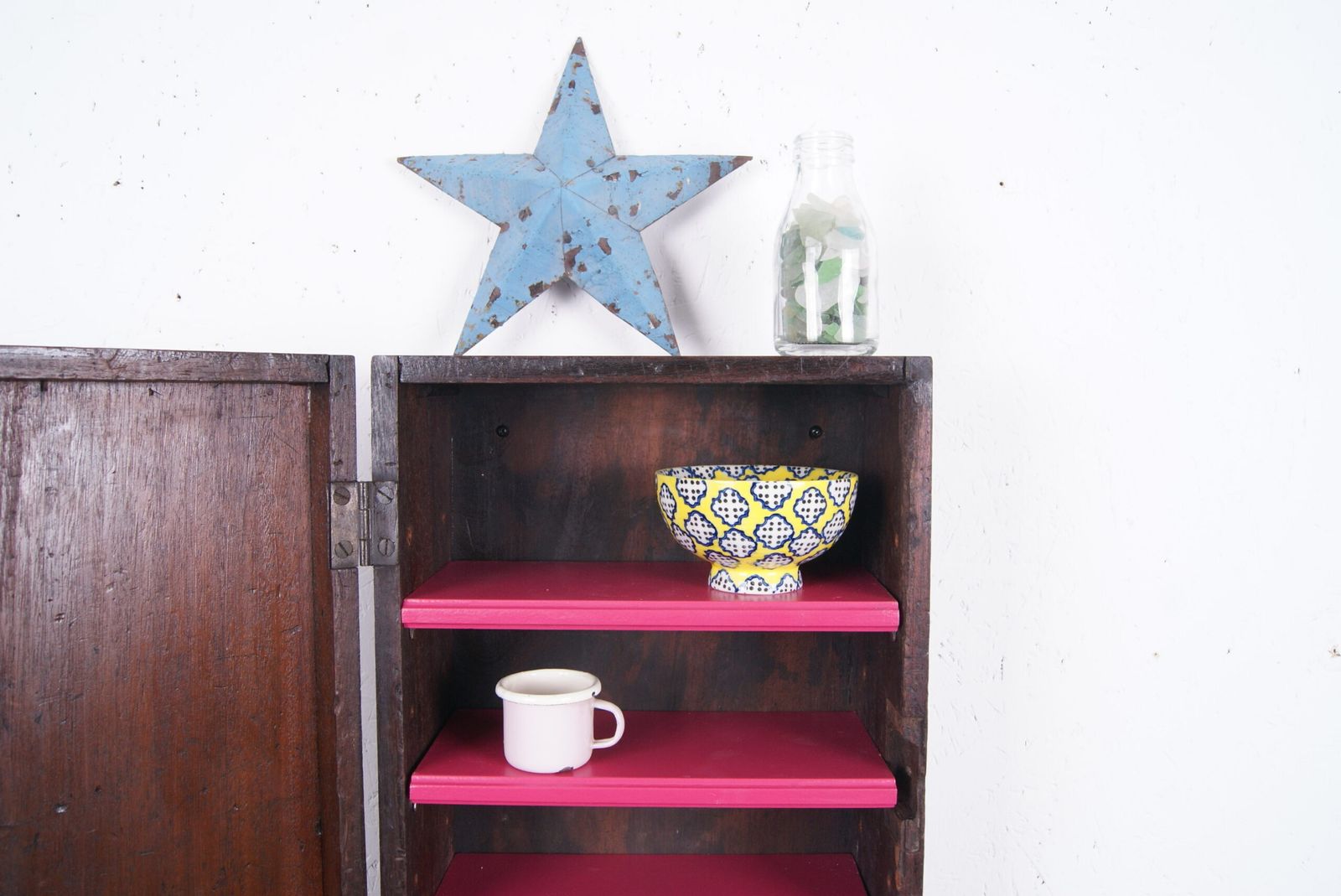 Wooden Wall Cabinet With Pink Shelves photo Furniture