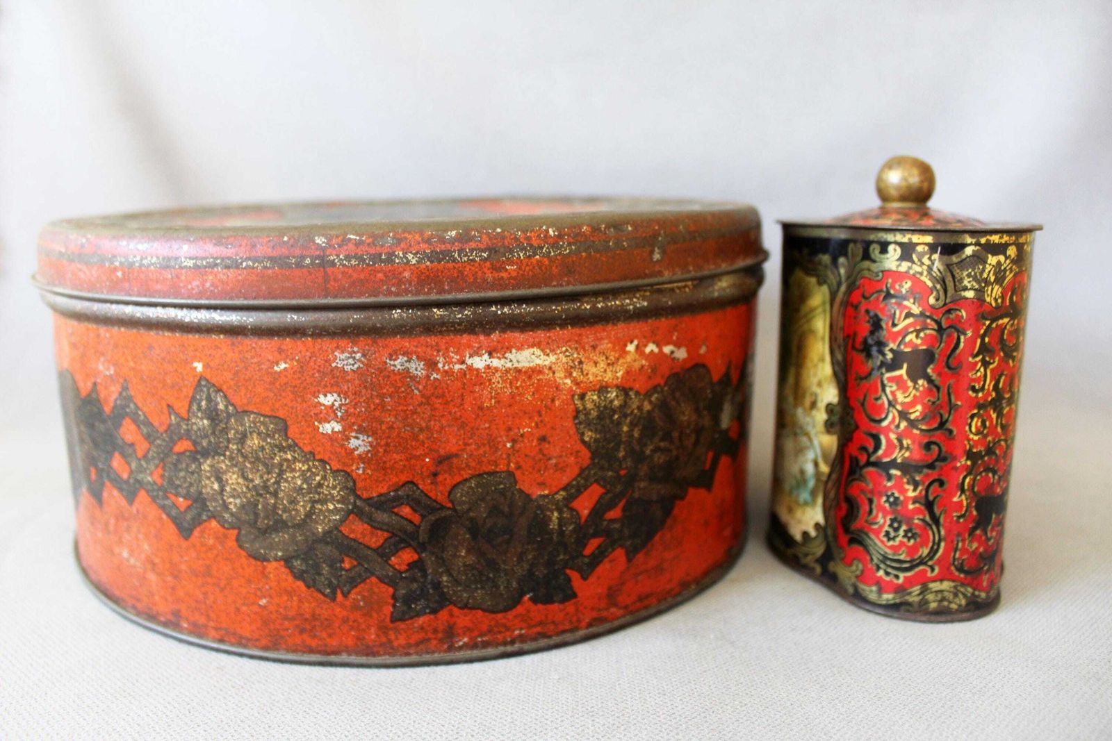 photo for sale Two Collectable Tin Metal Boxes, One Very Large Round Art Nouveau Antique From Belgium, Vintage Western Germany, Red, Embossed